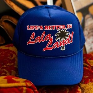 Dressed In La La Land “ Life’s better in Lala Land “ Blue Otto Trucker Hat NWT